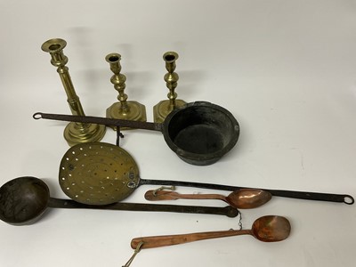 Lot 281 - Items of 18th century metalwork to include a brass and iron skimmer, bronze ladle and one other with rest, two Georgian copper serving spoons (one stamped with silver inlaid crown and HTL, and one...