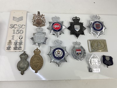 Lot 589 - Collection of Police helmet plates, East Suffolk Constabulary belt buckle and other insignia (1 box)