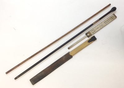 Lot 972 - Victorian London Pattern rosewood gun cleaning rod, draper's rule and surveyors' rule and slide rule (4)