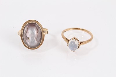 Lot 897 - 9ct gold moonstone cabochon ring and yellow metal carved mother of pearl cameo ring (2)