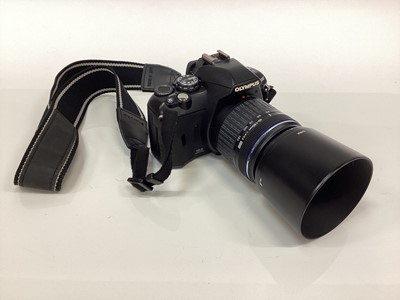 Lot 2380 - Olympus E400 DSLR camera, two lenses and accessories.