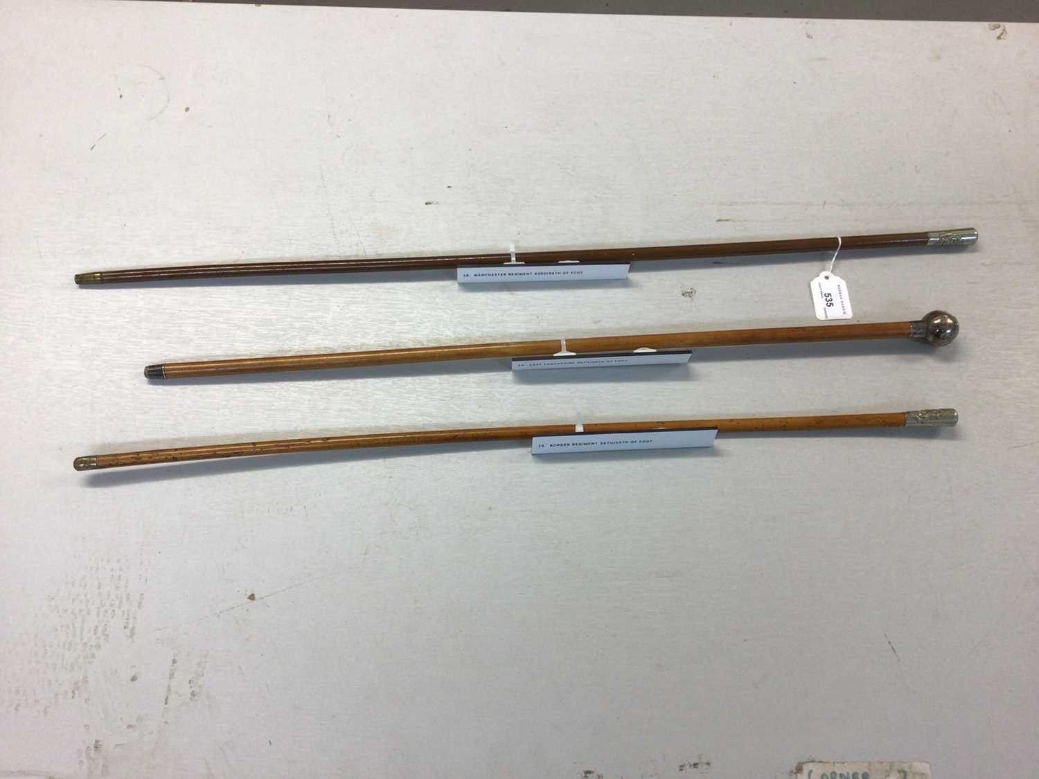 Lot 535 - Manchester Regiment swagger stick, East Lancashire Regiment swagger stick Border Regiment swagger stick (3)