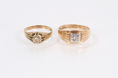 Lot 902 - Two 9ct gold diamond single stone gypsy rings