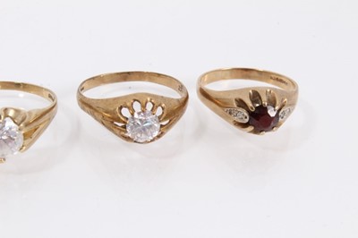 Lot 905 - 9ct gold ruby and diamond ring in claw setting, together with three other 9ct gold white synthetic single stone rings (4)