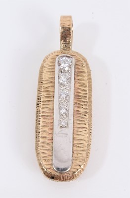 Lot 907 - Diamond set textured pendant with a vertical line of five graduated brilliant cut diamonds