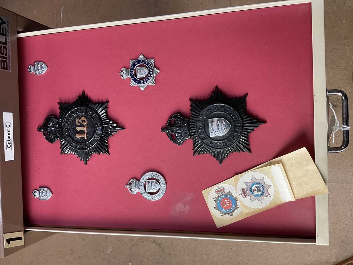 Lot 622 - Thirty draws containing a well presented collection of British Police badges and insignia with annotations, contained in a metal filing cabinet.