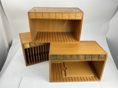 Lot 625 - Three British military oak Pigeon holes, together with a map box and other painted wooden box (5)