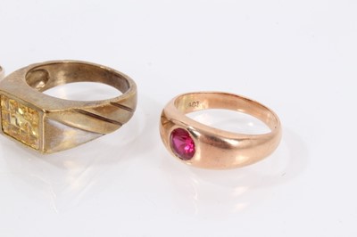 Lot 911 - 9ct gold red cabochon ring, 9ct gold red synthetic stone ring and 9ct gold yellow synthetic stone ring (3)
