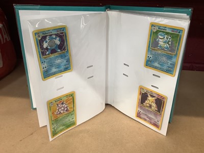 Lot 1521 - Pokémon cards to include rare base set Wizards of the coast Charizard 4/102 in very good condition with fourteen other Holographic Cards and others