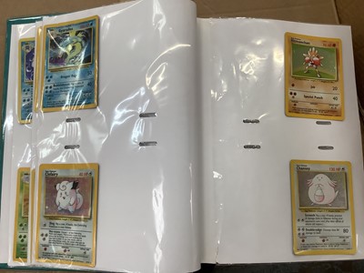 Lot 1521 - Pokémon cards to include rare base set Wizards of the coast Charizard 4/102 in very good condition with fourteen other Holographic Cards and others