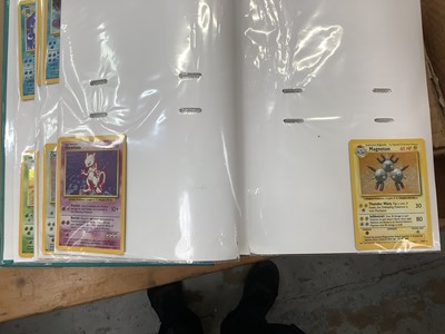 Lot 1521 - Pokémon cards to include rare base set Wizards of the coast Charizard 4/102 in very good condition with fourteen other Holographic Cards and others