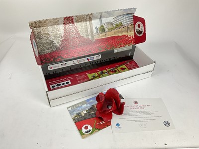 Lot 652 - Paul Cummins Tower of London ceramic poppy, one of 888,246 placed outside the Tower of London in 2014 to marks the centenary of the First World War, in original box with paperwork.