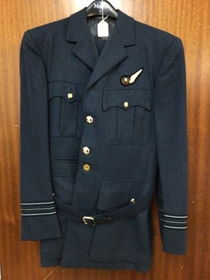 Lot 628 - RAF Squadron Leader's Mess Dress jacket with Navigators insignia, together with a matching jacket and trousers, a Flight Lieutenant's jacket and another RAF jacket (4)