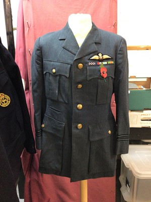 Lot 629 - RAF Flight Lieutenants service dress jacket with wings badge and mounted ribbons for Distinguished Flying Cross, 1939 - 1945 Star, Air Crew Europe Star and Defence medals, the pocket with original...