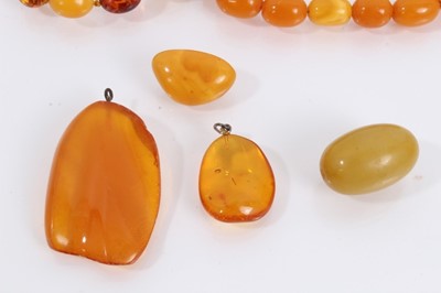 Lot 944 - Group of amber jewellery including a bracelet with 9ct gold clasp