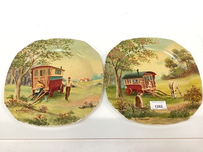 Lot 349 - Beefeater doll and two  porcelain plates painted with gypsy caravans, signed L.V. Norwood