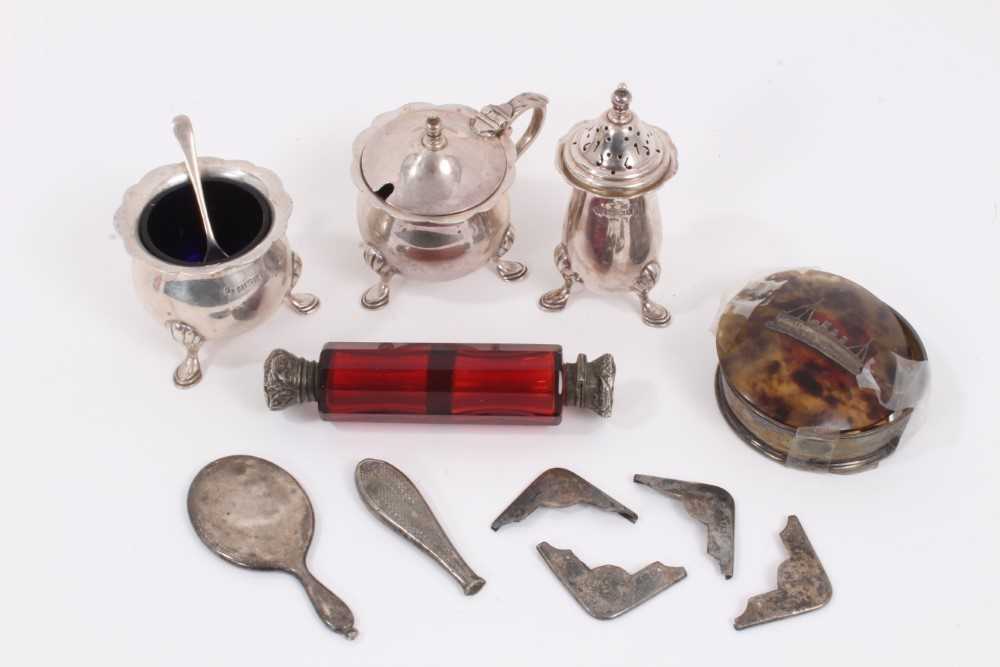 Lot 947 - Silver three piece condiment set, Victorian silver mounted ruby glass double ended scent bottle, together with other silver items