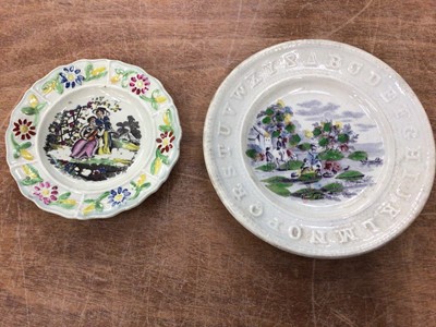 Lot 83 - An early 19th century pearlware alphabet plate, and another small pearlware dish (2)