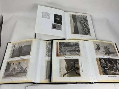 Lot 662 - Interesting collection of three albums containing nearly 250 Second World War Official Press photographs depicting all aspects of the War, all of which have been torn in half as rejects. The photog...