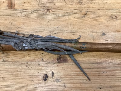 Lot 2502 - Two old lacrosse sticks and an old discus (3)