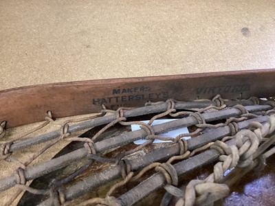 Lot 2502 - Two old lacrosse sticks and an old discus (3)