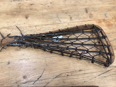 Lot 2502 - Two old lacrosse sticks and an old discus (3)