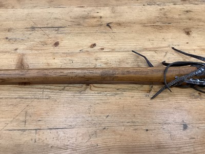 Lot 2502 - Two old lacrosse sticks and an old discus (3)