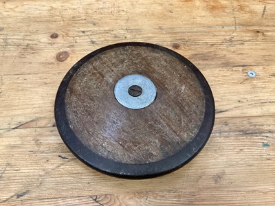 Lot 2502 - Two old lacrosse sticks and an old discus (3)