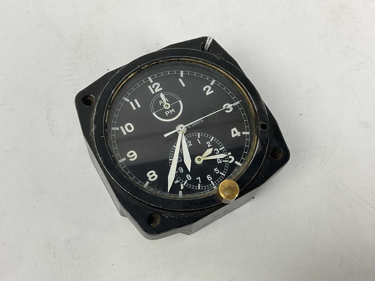 Lot 666 - Second World War period aircraft cockpit clock, with brass label to reverse for Camerer Cuss