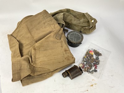 Lot 668 - Second World War canvas webbing bag, together with a Second World War aircraft compass, First World War Monocular dated 1914 and group of military badges.