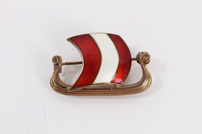Lot 953 - Norwegian silver and enamel Viking longship brooch, silver and enamel butterfly brooch and an Art Nouveau silver, shell and turquoise cabochon brooch (3)