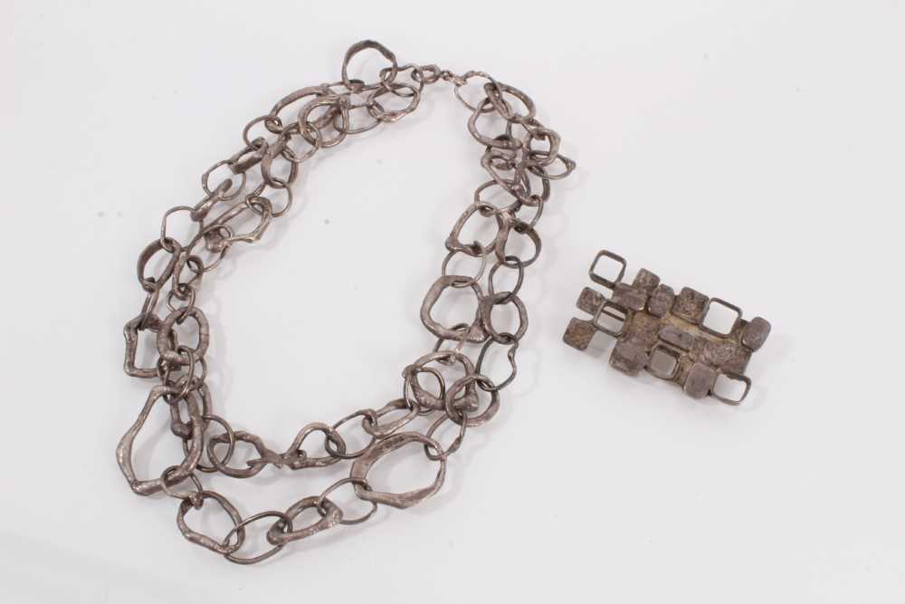 Lot 954 - 1970s silver abstract link double row necklace and brooch, both by Graham Watling