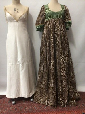 Lot 2129 - 1970s Annacat cream evening dress with gilt chain straps, Etam voluminous hostess dress with short double layer angel sleeves, Ayesha Davar kaftan style maxi and wide short sleeves in printed Indi...