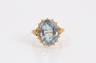Lot 956 - Victorian style 9ct gold blue stone cocktail ring in ornate carved setting