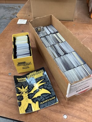 Lot 1525 - Box containing large quantity of Sun & Moon Forbidden Light Pokemon Cards.