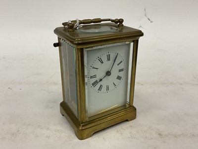 Lot 2563 - French brass cased carriage clock and key