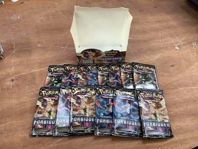 Lot 1527 - Fourteen Sun & Moon Forbidden Light Pokémon cards Packs