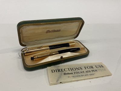 Lot 2566 - Pelikan fountain pen and pencil set in original case, the pen with 14k nib