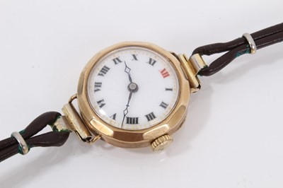 Lot 964 - Vintage 9ct gold cased wristwatch on leather strap and three antique 9ct gold bar brooches