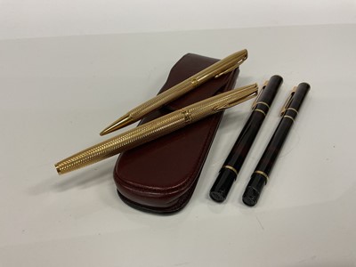 Lot 2567 - A Waterman fountain pen, ballpoint pen and pencil set, the fountain pen with 18k nib, in a leather case