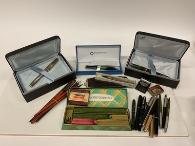 Lot 2570 - A group of pens and pencils, including a silver propelling pencil, Parker pens, two cased Inoxcrom pens, etc