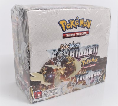 Lot 1534 - Pokemon TCG Sun & Moon Forbidden Light booster box factory sealed