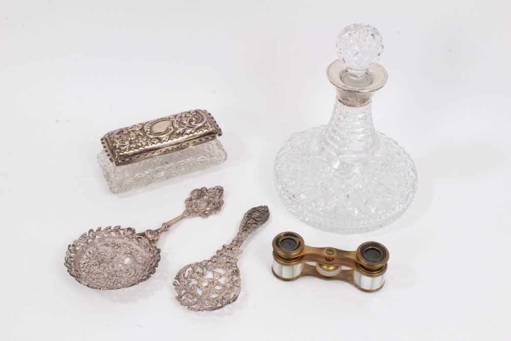 Lot 973 - Silver mounted cut glass decanter, silver topped glass trinket box, two Continental white metal spoons and pair of French mother of pearl opera glasses