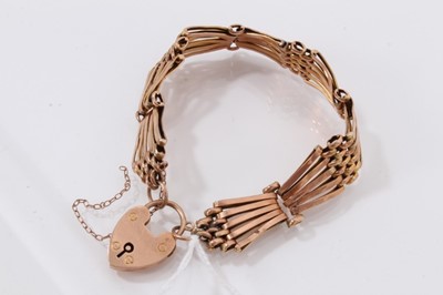 Lot 978 - 9ct rose gold gate bracelet with padlock clasp