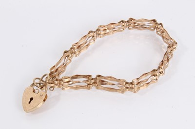 Lot 979 - Two 9ct gold gate bracelets with padlock clasps