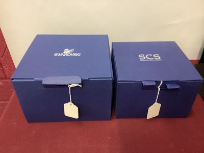Lot 1322 - Swarovski crystal shoal of Fish on coral together with a young Whale, both boxed