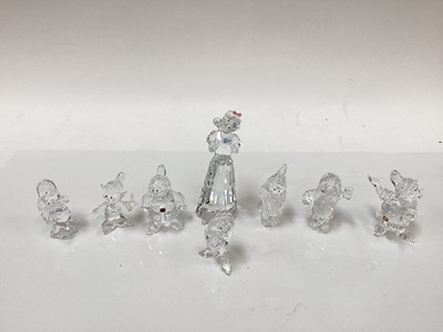 Lot 1324 - Swarovski crystal Disney figures to include Snow White and the seven dwarfs and four other Swarovski Disney figures, all boxed (12)