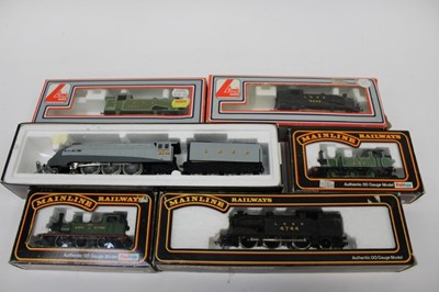 Lot 1876 - Railway mainline OO gauge three boxed locomotives plus two boxed Lima locomotives (no tenders) and a Liliput Silver Link loco & tender boxed (6)