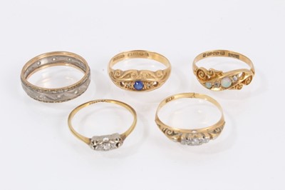 Lot 990 - Five antique and later 18ct gold rings, all with stones missing