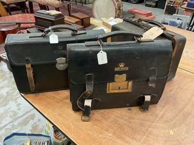 Lot 2560 - Two vintage leather Post Office satchels, together with a leather Gladstone bag (3)